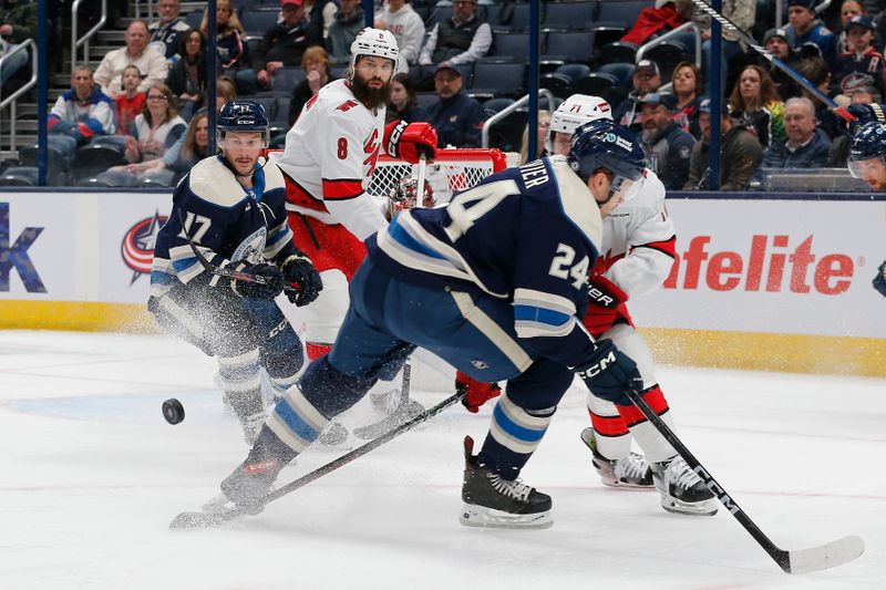 Feb 29, 2024; Columbus, Ohio, USA; Columbus Blue Jackets right wing Justin Danforth (17) skates after a loose puck Carolina Hurricanes during the first period at Nationwide Arena. Mandatory Credit: Russell LaBounty-USA TODAY Sports