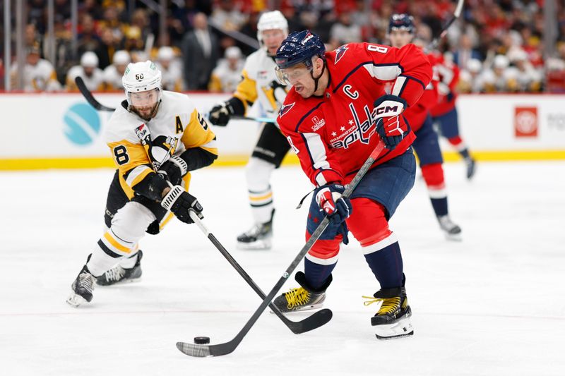 Apr 4, 2024; Washington, District of Columbia, USA; Washington Capitals left wing Alex Ovechkin (8) skates with the puck as Pittsburgh Penguins defenseman Kris Letang (58) defends in the third period at Capital One Arena. Mandatory Credit: Geoff Burke-USA TODAY Sports