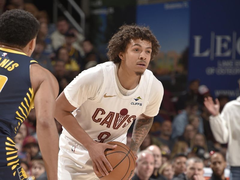 CLEVELAND, OH - APRIL 13: Craig Porter Jr. #9 of the Cleveland Cavaliers passes the ball during the game against the Indiana Pacers  on April 13, 2025 at Rocket Arena in Cleveland, Ohio. NOTE TO USER: User expressly acknowledges and agrees that, by downloading and/or using this Photograph, user is consenting to the terms and conditions of the Getty Images License Agreement. Mandatory Copyright Notice: Copyright 2025 NBAE (Photo by David Liam Kyle/NBAE via Getty Images)