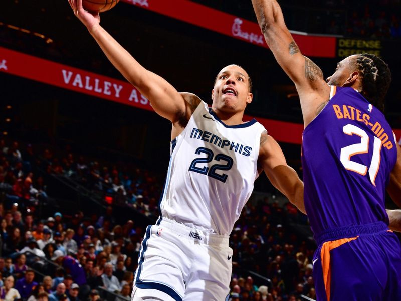 PHOENIX, AZ - JANUARY 7: Desmond Bane #22 of the Memphis Grizzlies shoots the ball during the game against the Phoenix Suns on January 7, 2024 at Footprint Center in Phoenix, Arizona. NOTE TO USER: User expressly acknowledges and agrees that, by downloading and or using this photograph, user is consenting to the terms and conditions of the Getty Images License Agreement. Mandatory Copyright Notice: Copyright 2024 NBAE (Photo by Barry Gossage/NBAE via Getty Images)