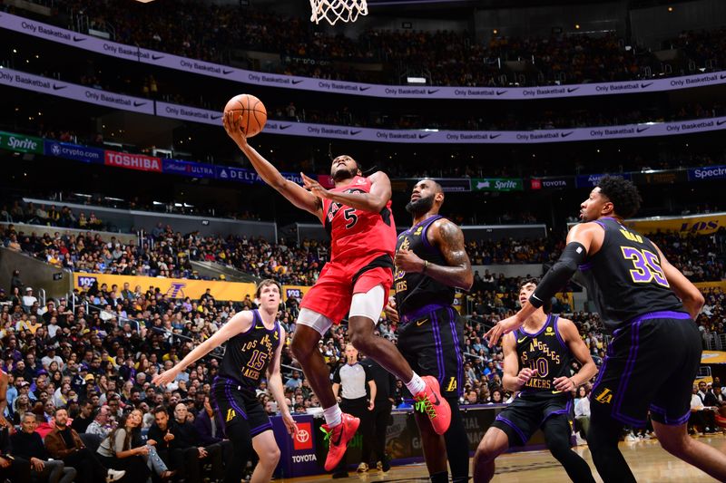 LOS ANGELES, CA - JANUARY 9: Precious Achiuwa #5 of the Toronto Raptors drives to the basket during the game against the Los Angeles Lakers on January 9, 2024 at Crypto.Com Arena in Los Angeles, California. NOTE TO USER: User expressly acknowledges and agrees that, by downloading and/or using this Photograph, user is consenting to the terms and conditions of the Getty Images License Agreement. Mandatory Copyright Notice: Copyright 2024 NBAE (Photo by Adam Pantozzi/NBAE via Getty Images)