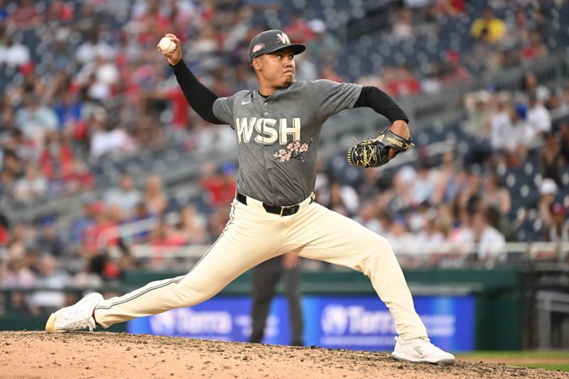 Aug 31, 2024; Washington, District of Columbia, USA; Washington Nationals relief pitcher Eduardo Salazar (62) throws a pitch against the Chicago Cubs during the eighth inning at Nationals Park. Mandatory Credit: Rafael Suanes-USA TODAY Sports