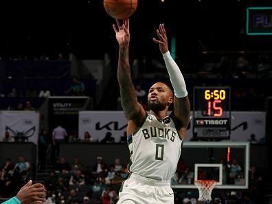 CHARLOTTE, NC - NOVEMBER 17: Damian Lillard #0 of the Milwaukee Bucks shoots a three point basket during the game against the Charlotte Hornets during the In-Season Tournament on November 17, 2023 at Spectrum Center in Charlotte, North Carolina. NOTE TO USER: User expressly acknowledges and agrees that, by downloading and or using this photograph, User is consenting to the terms and conditions of the Getty Images License Agreement. Mandatory Copyright Notice: Copyright 2023 NBAE (Photo by Kent Smith/NBAE via Getty Images)