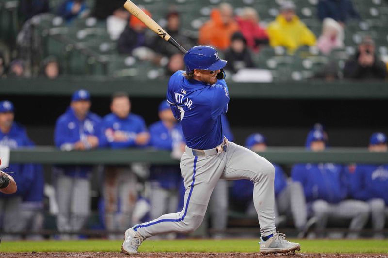 Apr 3, 2024; Baltimore, Maryland, USA; Kansas City Royals  shortstop Bobby Witt Jr. (7) connects with a single in the third inning against the Baltimore Orioles at Oriole Park at Camden Yards. Mandatory Credit: Mitch Stringer-USA TODAY Sports