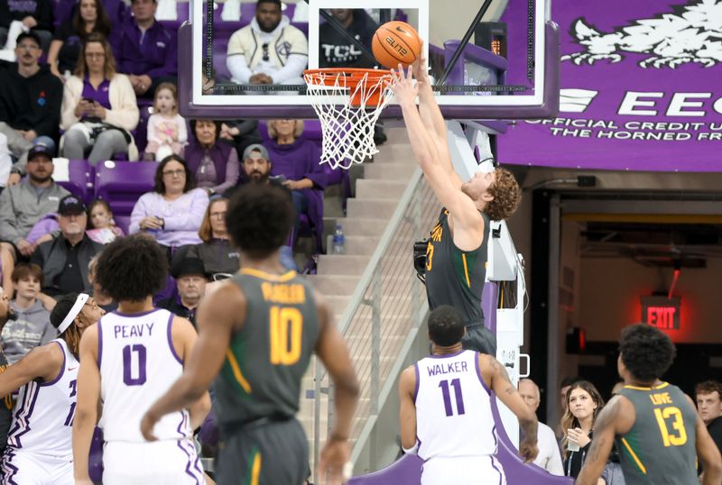 Feb 11, 2023; Fort Worth, Texas, USA;  Baylor Bears forward Caleb Lohner (33) dunks during the first half against the TCU Horned Frogs at Ed and Rae Schollmaier Arena. Mandatory Credit: Kevin Jairaj-USA TODAY Sports