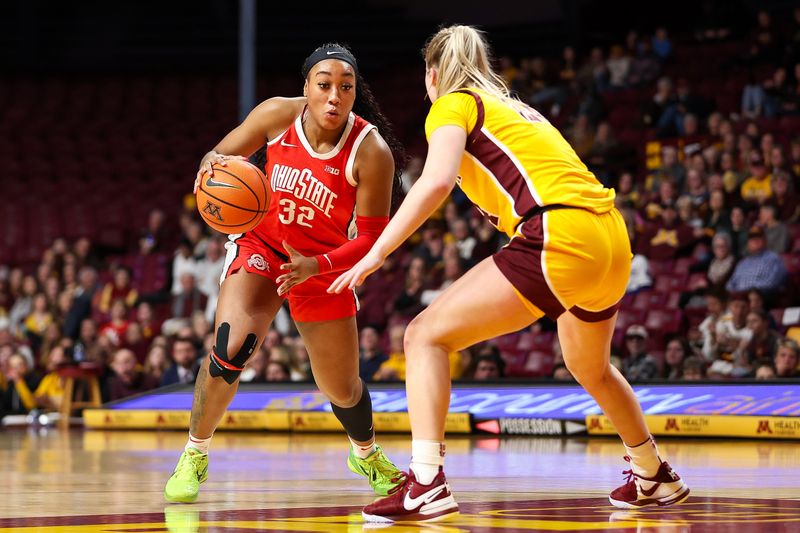 Feb 8, 2024; Minneapolis, Minnesota, USA; Ohio State Buckeyes forward Cotie McMahon (32) dribbles as Minnesota Golden Gophers forward Mallory Heyer (24) defends during the second half at Williams Arena. Mandatory Credit: Matt Krohn-USA TODAY Sports