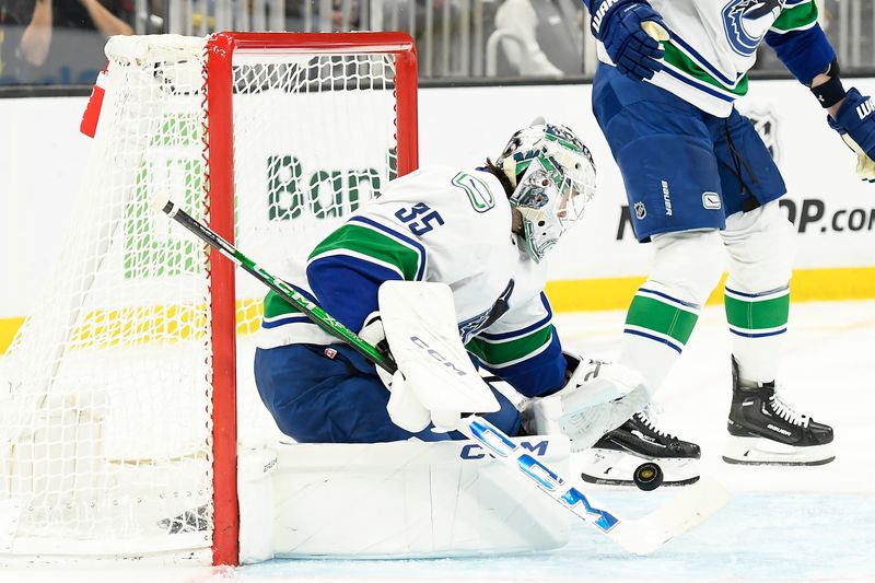 Feb 8, 2024; Boston, Massachusetts, USA; Vancouver Canucks goaltender Thatcher Demko (35) makes a save during the third period against the Boston Bruins at TD Garden. Mandatory Credit: Bob DeChiara-USA TODAY Sports