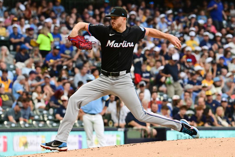 Jul 26, 2024; Milwaukee, Wisconsin, USA;  Miami Marlins starting pitcher Trevor Rogers (28) pitches in the first inning against the Milwaukee Brewers at American Family Field. Mandatory Credit: Benny Sieu-USA TODAY Sports