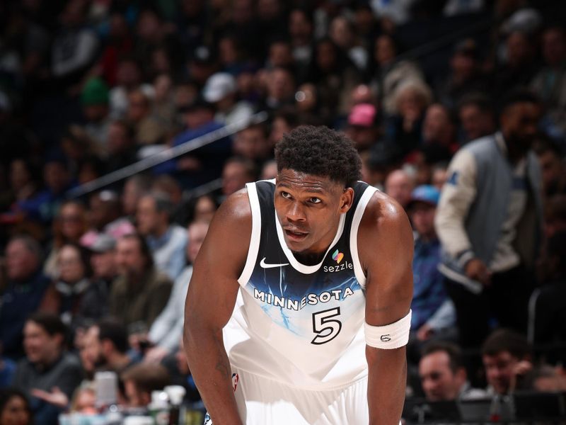 MINNEAPOLIS, MN -  JANUARY 27:  Anthony Edwards #5 of the Minnesota Timberwolves looks on during the game against the Atlanta Hawks on January 27, 2025 at Target Center in Minneapolis, Minnesota. NOTE TO USER: User expressly acknowledges and agrees that, by downloading and or using this Photograph, user is consenting to the terms and conditions of the Getty Images License Agreement. Mandatory Copyright Notice: Copyright 2025 NBAE (Photo by David Sherman/NBAE via Getty Images)