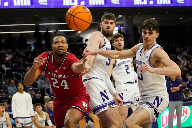 Jan 29, 2025; Evanston, Illinois, USA; Rutgers Scarlet Knights center Lathan Sommerville (24) and Northwestern Wildcats guard Brooks Barnhizer (13) go for the ball during the first half at Welsh-Ryan Arena. Mandatory Credit: David Banks-Imagn Images