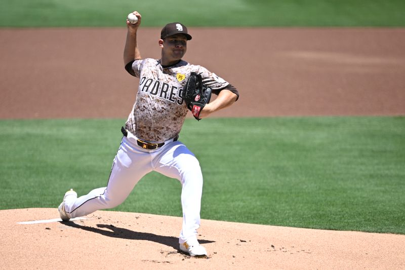 Apr 28, 2024; San Diego, California, USA; San Diego Padres starting pitcher Michael King (34) throws a pitch against the Philadelphia Phillies during the first inning at Petco Park. Mandatory Credit: Orlando Ramirez-USA TODAY Sports