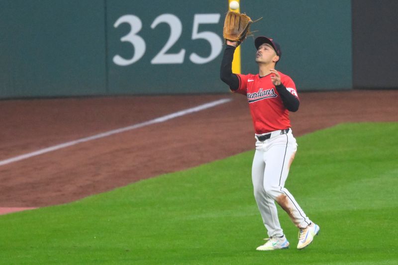 Apr 23, 2024; Cleveland, Ohio, USA; Cleveland Guardians left fielder Steven Kwan (38) makes a catch in the fourth inning against the Boston Red Sox at Progressive Field. Mandatory Credit: David Richard-USA TODAY Sports