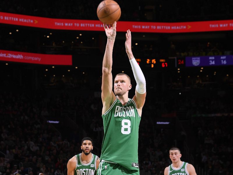 BOSTON, MA - APRIL 5:  Kristaps Porzingis #8 of the Boston Celtics shoots a free throw during the game against the Sacramento Kings on April 5, 2024 at the TD Garden in Boston, Massachusetts. NOTE TO USER: User expressly acknowledges and agrees that, by downloading and or using this photograph, User is consenting to the terms and conditions of the Getty Images License Agreement. Mandatory Copyright Notice: Copyright 2024 NBAE  (Photo by Brian Babineau/NBAE via Getty Images)