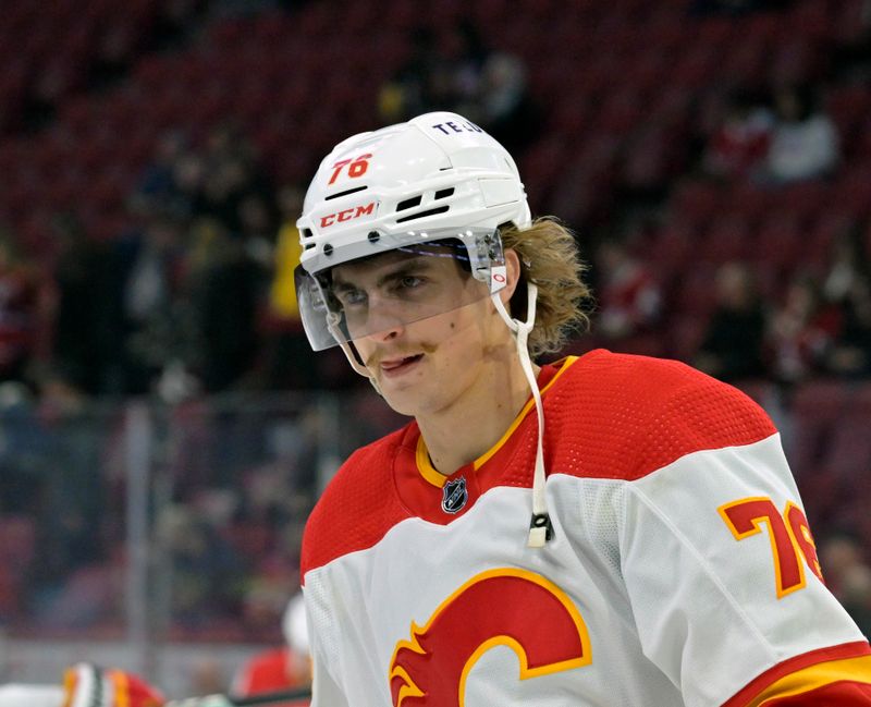 Nov 14, 2023; Montreal, Quebec, CAN; Calgary Flames forward Martin Pospisil (76) skates during the warm up period before the game against the Montreal Canadiens at the Bell Centre. Mandatory Credit: Eric Bolte-USA TODAY Sports