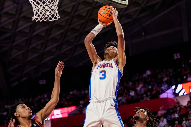 Feb 28, 2023; Athens, Georgia, USA; Florida Gators forward Alex Fudge (3) shoots at the basket against the Georgia Bulldogs during the first half at Stegeman Coliseum. Mandatory Credit: Dale Zanine-USA TODAY Sports