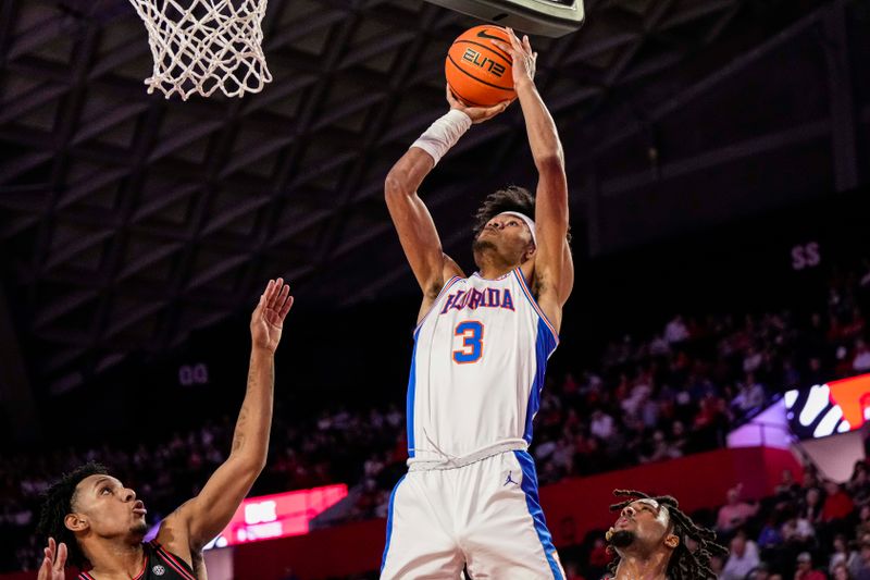 Feb 28, 2023; Athens, Georgia, USA; Florida Gators forward Alex Fudge (3) shoots at the basket against the Georgia Bulldogs during the first half at Stegeman Coliseum. Mandatory Credit: Dale Zanine-USA TODAY Sports