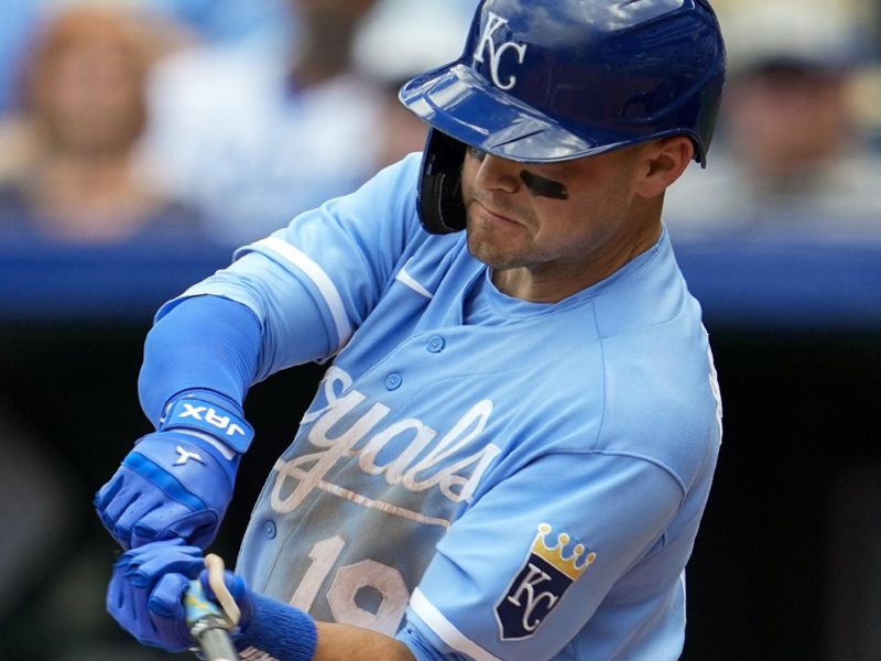 Sep 20, 2023; Kansas City, Missouri, USA; Kansas City Royals second baseman Michael Massey (19) hits a single during the seventh inning against the Cleveland Guardians at Kauffman Stadium. Mandatory Credit: Jay Biggerstaff-USA TODAY Sports