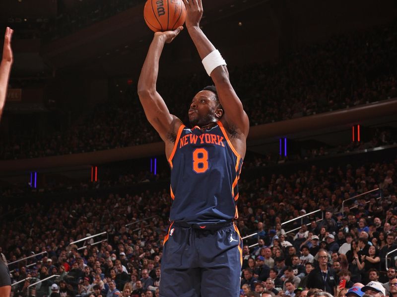 NEW YORK, NY - NOVEMBER 8: OG Anunoby #8 of the New York Knicks shoots a three point basket during the game against the Milwaukee Bucks on November 8, 2024 at Madison Square Garden in New York City, New York.  NOTE TO USER: User expressly acknowledges and agrees that, by downloading and or using this photograph, User is consenting to the terms and conditions of the Getty Images License Agreement. Mandatory Copyright Notice: Copyright 2024 NBAE  (Photo by Nathaniel S. Butler/NBAE via Getty Images)