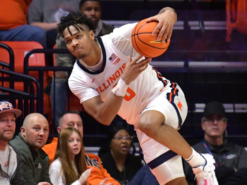 Dec 29, 2022; Champaign, Illinois, USA;  Illinois Fighting Illini guard Terrence Shannon Jr. (0) tries to save the ball in bounds during the second half against the Bethune-Cookman Wildcats at State Farm Center. Mandatory Credit: Ron Johnson-USA TODAY Sports