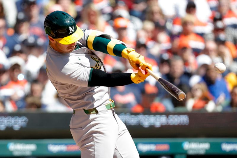 Apr 6, 2024; Detroit, Michigan, USA;  Oakland Athletics left fielder Brent Rooker (25) hits a two run home run against the Detroit Tigers in the first inning at Comerica Park. Mandatory Credit: Rick Osentoski-USA TODAY Sports