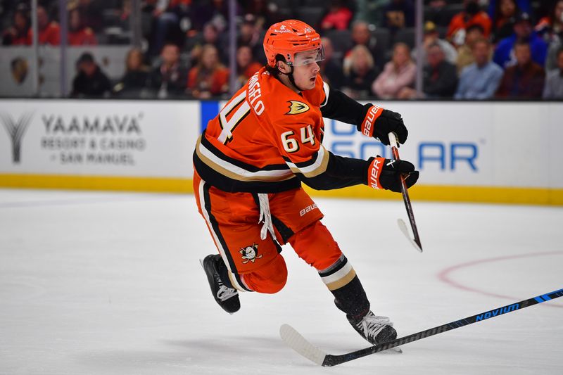 Apr 7, 2025; Anaheim, California, USA; Anaheim Ducks right wing Sam Colangelo (64) shoots against the Edmonton Oilers during the second period at Honda Center. Mandatory Credit: Gary A. Vasquez-Imagn Images