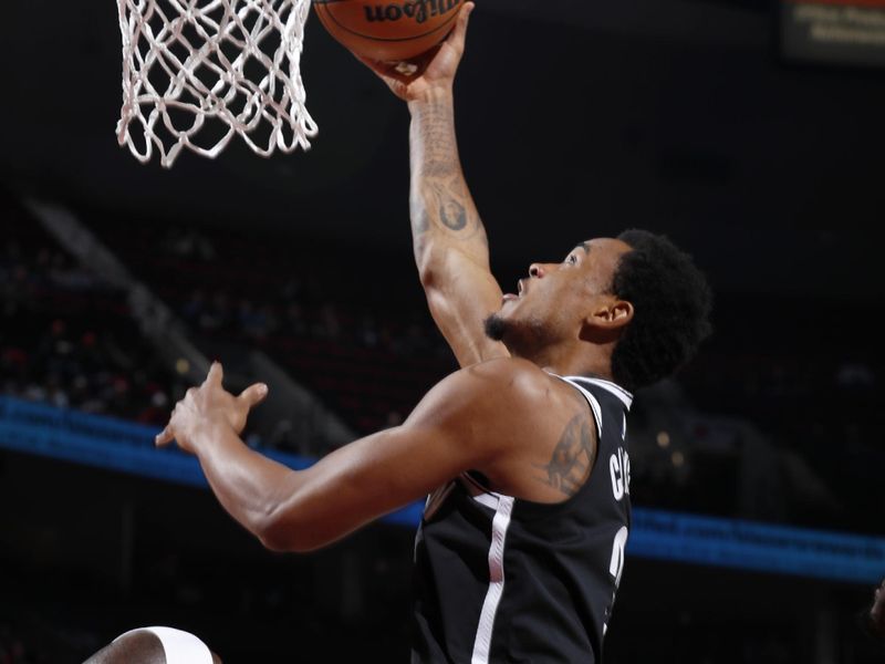 PORTLAND, OR - JANUARY 17: Nicolas Claxton #33 of the Brooklyn Nets drives to the basket during the game against the Portland Trail Blazers on January 17, 2024 at the Moda Center Arena in Portland, Oregon. NOTE TO USER: User expressly acknowledges and agrees that, by downloading and or using this photograph, user is consenting to the terms and conditions of the Getty Images License Agreement. Mandatory Copyright Notice: Copyright 2024 NBAE (Photo by Cameron Browne/NBAE via Getty Images)