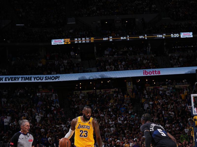 DENVER, CO - APRIL 22: LeBron James #23 of the Los Angeles Lakers handles the ball during the game against the Denver Nuggets on April 22, 2024 at the Ball Arena in Denver, Colorado. NOTE TO USER: User expressly acknowledges and agrees that, by downloading and/or using this Photograph, user is consenting to the terms and conditions of the Getty Images License Agreement. Mandatory Copyright Notice: Copyright 2024 NBAE (Photo by Bart Young/NBAE via Getty Images)