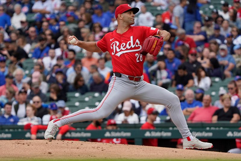 Sep 27, 2024; Chicago, Illinois, USA; Cincinnati Reds pitcher Nick Martinez (28) throws the ball against the Chicago Cubs during the first inning at Wrigley Field. Mandatory Credit: David Banks-Imagn Images