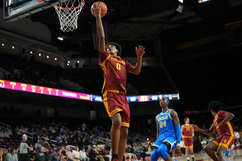 Mar 7, 2026; Los Angeles, California, USA; Southern California Trojans guard Alijah Arenas (0) shoots the ball against the UCLA Bruins in the second half at the Galen Center. Mandatory Credit: Kirby Lee-Imagn Images