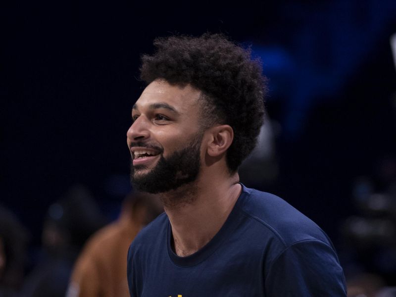 NEW YORK, NEW YORK - OCTOBER 29: Jamal Murray #27 of the Denver Nuggets warms up prior to game against the Brooklyn Nets at Barclays Center on October 29, 2024 in New York City. (Photo by Michelle Farsi/Getty Images)