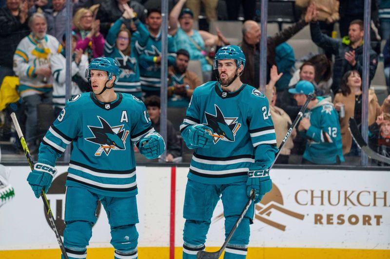 Jan 18, 2023; San Jose, California, USA; San Jose Sharks defenseman Jaycob Megna (24) and San Jose Sharks center Nick Bonino (13) celebrate after the goal against the Dallas Stars during the second period at SAP Center at San Jose. Mandatory Credit: Neville E. Guard-USA TODAY Sports