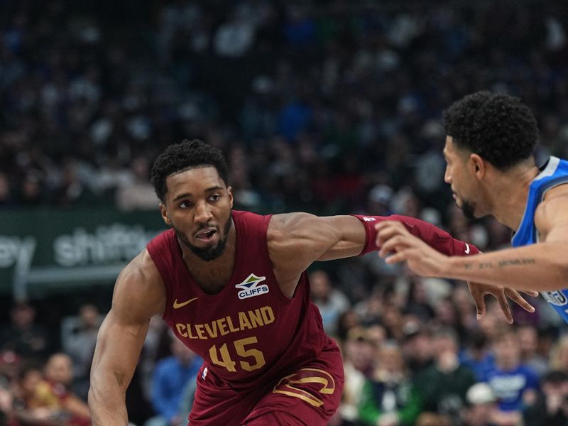 DALLAS, TX - JANUARY 03:  Donovan Mitchell #45 of the Cleveland Cavaliers dribbles the ball during the game against the Dallas Mavericks on January 3, 2025 at American Airlines Center in Dallas, Texas. NOTE TO USER: User expressly acknowledges and agrees that, by downloading and or using this photograph, User is consenting to the terms and conditions of the Getty Images License Agreement. Mandatory Copyright Notice: Copyright 2025 NBAE (Photo by Glenn James/NBAE via Getty Images)