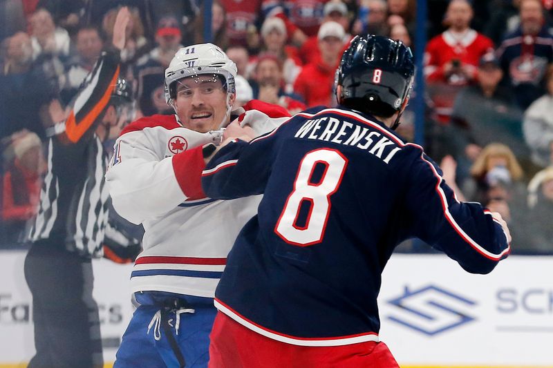 Nov 27, 2024; Columbus, Ohio, USA; Columbus Blue Jackets defenseman Zach Werenski (8) and Montreal Canadiens right wing Brendan Gallagher (11) fight during the second period at Nationwide Arena. Mandatory Credit: Russell LaBounty-Imagn Images