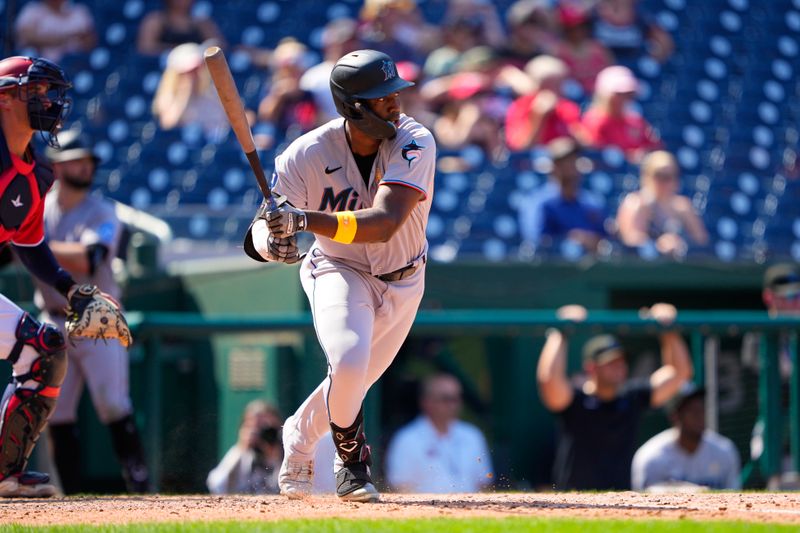 Sep 3, 2023; Washington, District of Columbia, USA;  Miami Marlins right fielder Jesus Sanchez (7) hits a single against the Washington Nationals during the sixth inning at Nationals Park. Mandatory Credit: Gregory Fisher-USA TODAY Sports