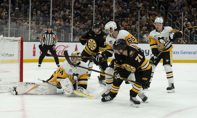 Jan 11, 2026; Boston, Massachusetts, USA; Boston Bruins left-winger Viktor Arvidsson (71) scores during the first period of the game against the Pittsburgh Penguins at TD Garden. Mandatory Credit: Natalie Reid-Imagn Images