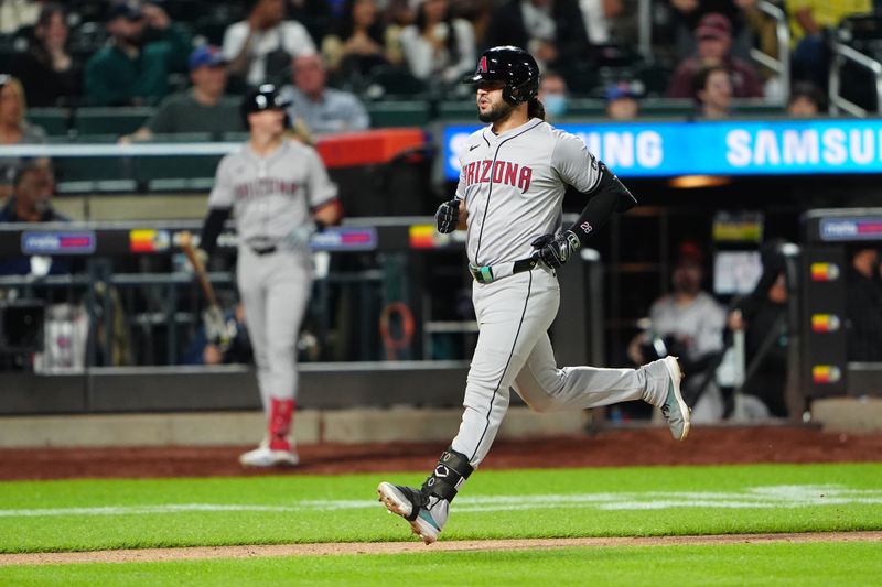 May 31, 2024; New York City, New York, USA; Arizona Diamondbacks third baseman Eugenio Suarez (28) rounds the bases after hitting a home run against the New York Mets during the sixth inning at Citi Field. Mandatory Credit: Gregory Fisher-USA TODAY Sports