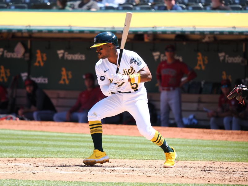 May 17, 2023; Oakland, California, USA; Oakland Athletics second baseman Tony Kemp (5) is walked against the Arizona Diamondbacks during the sixth inning at Oakland-Alameda County Coliseum. Mandatory Credit: Kelley L Cox-USA TODAY Sports