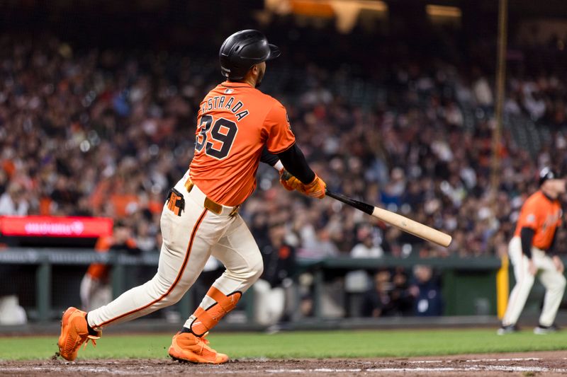 May 17, 2024; San Francisco, California, USA; San Francisco Giants second baseman Thairo Estrada (39) hits a three-run home run against the Colorado Rockies during the fifth inning at Oracle Park. Mandatory Credit: John Hefti-USA TODAY Sports