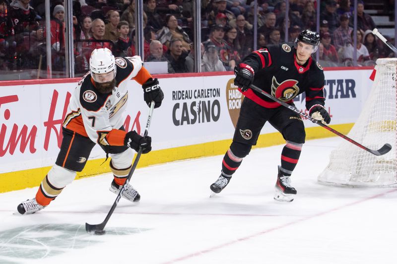 Feb 15, 2024; Ottawa, Ontario, CAN; Anaheim Ducks defenseman Radko Gudas (7) clears the puck Ottawa Senators away from Dominik Kubalik (81) in the first period at the Canadian Tire Centre. Mandatory Credit: Marc DesRosiers-USA TODAY Sports