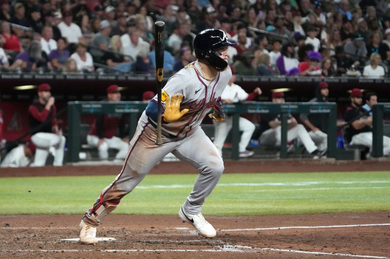 Apr 27, 2025; Phoenix, Arizona, USA; Atlanta Braves outfielder Alex Verdugo (8) hits a RBI double against the Arizona Diamondbacks in the fifth inning at Chase Field. Mandatory Credit: Rick Scuteri-Imagn Images