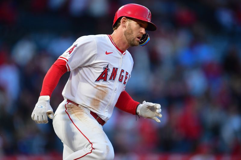 Apr 23, 2024; Anaheim, California, USA; Los Angeles Angels designated hitter Taylor Ward (3) runs after hitting at Angel Stadium. Mandatory Credit: Gary A. Vasquez-USA TODAY Sports