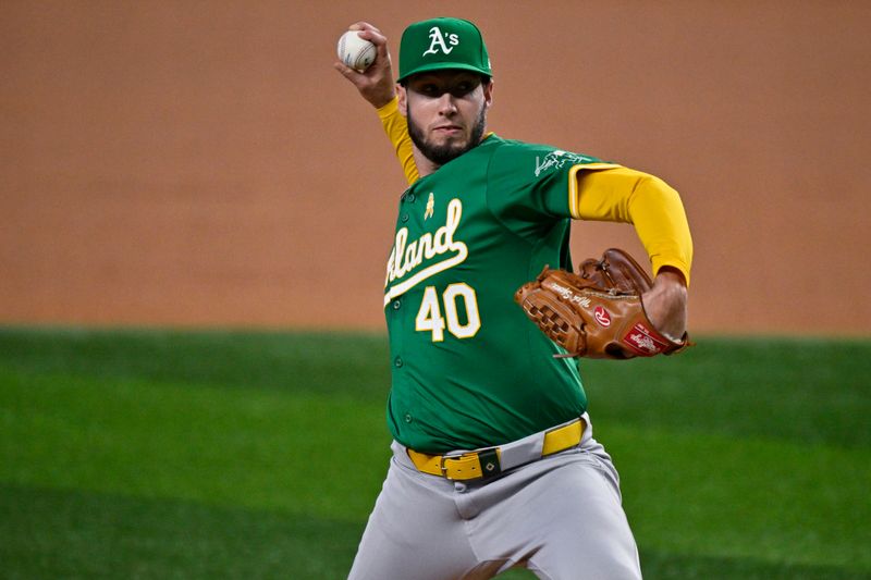 Sep 1, 2024; Arlington, Texas, USA; Oakland Athletics starting pitcher Mitch Spence (40) pitches against the Texas Rangers during the first inning at Globe Life Field. Mandatory Credit: Jerome Miron-USA TODAY Sports