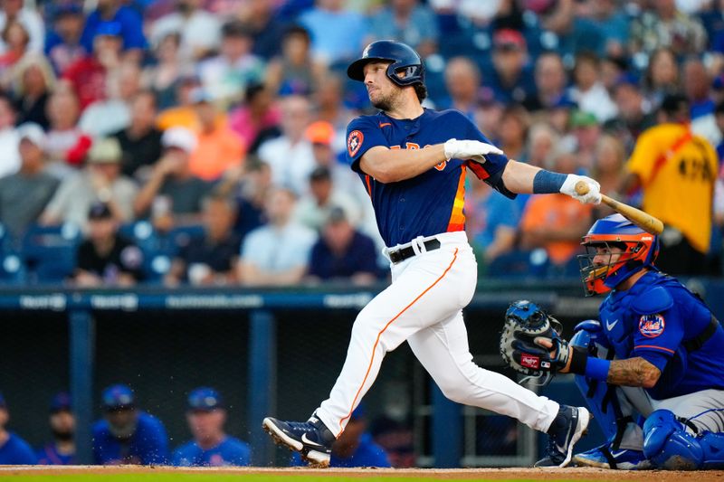 Mar 7, 2023; West Palm Beach, Florida, USA; Houston Astros third baseman Alex Bregman (2) hits a double against the New York Mets during the first inning at The Ballpark of the Palm Beaches. Mandatory Credit: Rich Storry-USA TODAY Sports