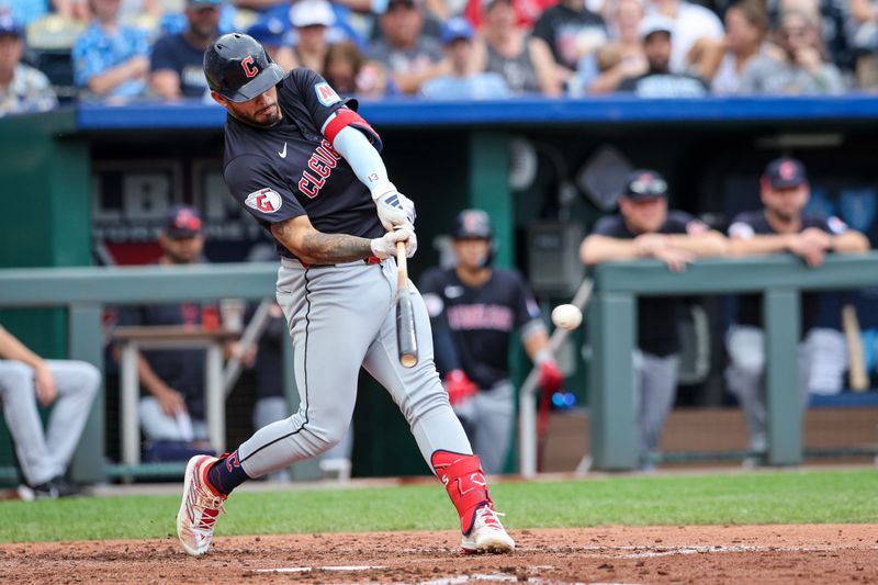 Jun 28, 2023; Kansas City, Missouri, USA; Cleveland Guardians third base Gabriel Arias (13) bats during the fifth inning against the Kansas City Royals at Kauffman Stadium. Mandatory Credit: William Purnell-USA TODAY Sports