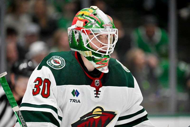 Jan 10, 2024; Dallas, Texas, USA; Minnesota Wild goaltender Jesper Wallstedt (30) faces the Dallas Stars attack during the second period at the American Airlines Center. Mandatory Credit: Jerome Miron-USA TODAY Sports