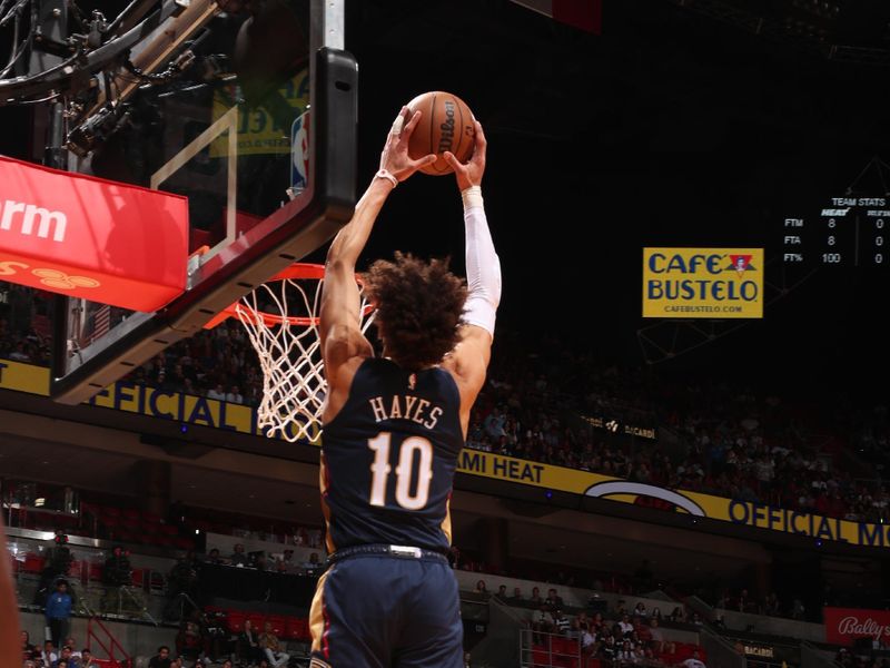 MIAMI, FL - JANUARY 22: Jaxson Hayes #10 of the New Orleans Pelicans dunks the ball during the game against the Miami Heat on January 22, 2023 at Miami-Dade Arena in Miami, Florida. NOTE TO USER: User expressly acknowledges and agrees that, by downloading and or using this Photograph, user is consenting to the terms and conditions of the Getty Images License Agreement. Mandatory Copyright Notice: Copyright 2023 NBAE (Photo by Issac Baldizon/NBAE via Getty Images).