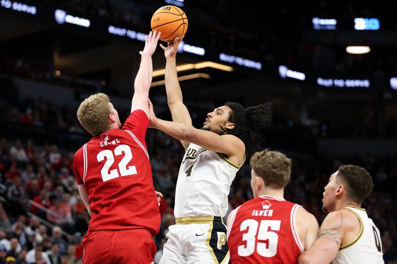 Mar 16, 2024; Minneapolis, MN, USA; Purdue Boilermakers forward Trey Kaufman-Renn (4) shoots as Wisconsin Badgers forward Steven Crowl (22) defends during the first half at Target Center. Mandatory Credit: Matt Krohn-USA TODAY Sports