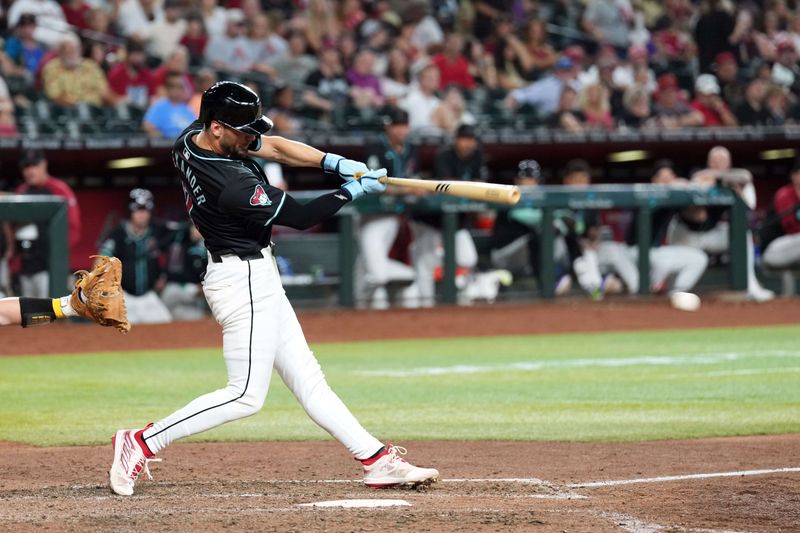 Jun 30, 2024; Phoenix, Arizona, USA; Arizona Diamondbacks pinch hitter Blaze Alexander (9) hits a two RBI single against the Oakland Athletics during the seventh inning at Chase Field. Mandatory Credit: Joe Camporeale-USA TODAY Sports