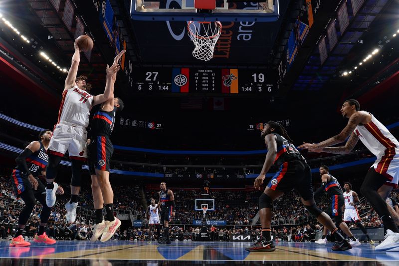 DETROIT, MI - NOVEMBER 12: Jaime Jaquez Jr. #11 of the Miami Heat drives to the basket during the game against the Detroit Pistons during the Emirates NBA Cup game on November 12, 2024 at Little Caesars Arena in Detroit, Michigan. NOTE TO USER: User expressly acknowledges and agrees that, by downloading and/or using this photograph, User is consenting to the terms and conditions of the Getty Images License Agreement. Mandatory Copyright Notice: Copyright 2024 NBAE (Photo by Chris Schwegler/NBAE via Getty Images)