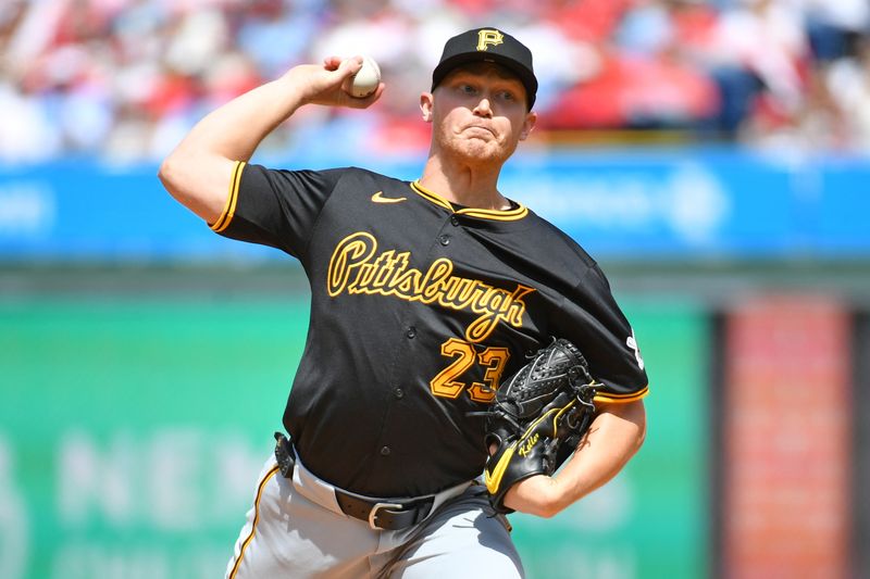 Apr 14, 2024; Philadelphia, Pennsylvania, USA; Pittsburgh Pirates pitcher Mitch Keller (23) throws a pitch during the first inning against the Philadelphia Phillies at Citizens Bank Park. Mandatory Credit: Eric Hartline-USA TODAY Sports